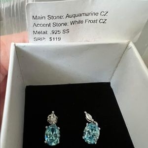 Brand new sterling silver And aquamarine earrings.
